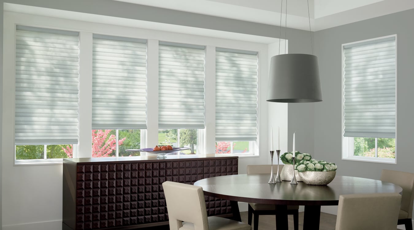 Cordless motorized shades in a Honolulu dining room